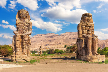 The Colossi of Memnon in the Theban Necropolis, statues of the Pharaoh Amenhotep, Luxor, Egypt