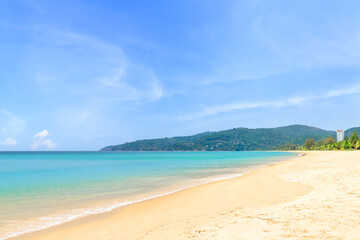 Fototapeta na wymiar Karon Beach with crystal clear water and wave, famous tourist destination and resort area, Phuket, Thailand