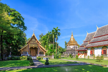 Ancient chapel and golden pagoda at Wat Chiang Man in Chiang Mai, North of Thailand - obrazy, fototapety, plakaty