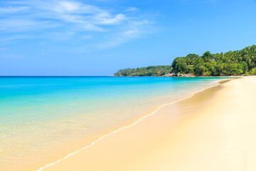 Surin Beach with crystal clear water and wave, famous tourist destination, Phuket, Thailand