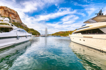 Splendid view of Poltu Quatu port and bay with luxury yachts on Costa Smeralda.