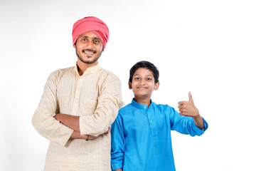 Indian farmer with his child on white background