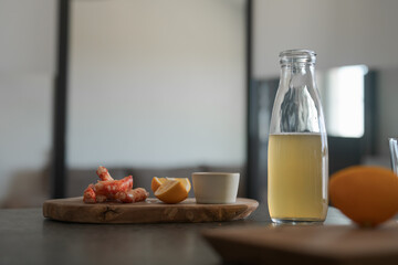 Crab legs with lemon and dressing on olive woob board