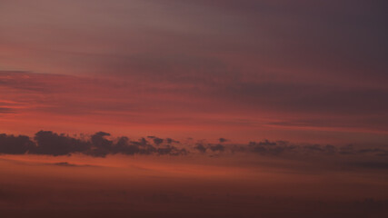 Sunset clouds in the sky in summer evening