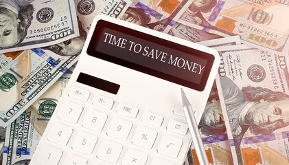 TIME TO SAVE MONEY text on display calculator on the dollars background