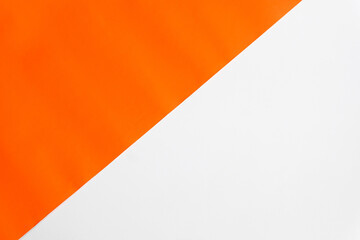 Orange color of paper on white board. abstract background.