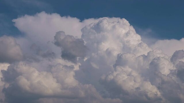 The clouds. Time-lapse is an excellent stock video containing footage of white fluffy clouds. These 1920 x 1080 (HD) frames are applicable for use in any project that relates to nature. These frames w