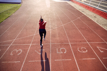man sprinter run on track stadium in athletics competition