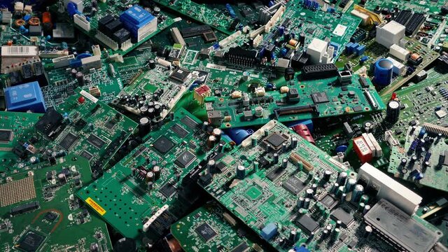 Generic Computer Boards Piled Up GPU CPU Tracking Shot