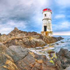 Gorgeous gloomy view of Capo Ferro Lighthouse.