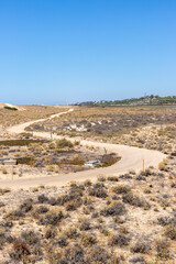 Winding dirt path in the Ria Formosa natural park, Algarve