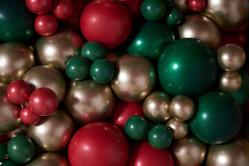 christmas decorations with colored balloons on background