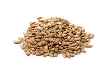 A pile of peeled sunflower seeds on a white background.