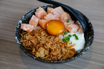 Grilled Salmon with rice, served in a bowl in the restaurant
