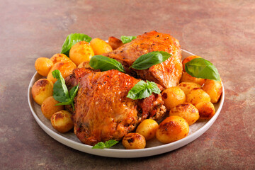 Roast turkey thighs with potatoes