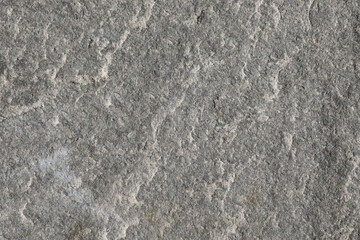 Fototapeta na wymiar Detail of gray granite stone surface