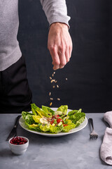 person making salad