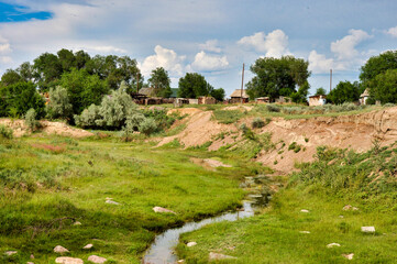 Fototapeta na wymiar Small village by the river