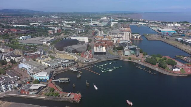 Aerial over Cardiff Bay, Pierhead building and Welsh Assembley (Seneddd) Wales, United Kingdom