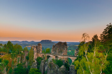 sunset scenery over the rock formations near the Bastei Bridge 
