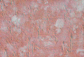 汚れたピンクの塗り壁