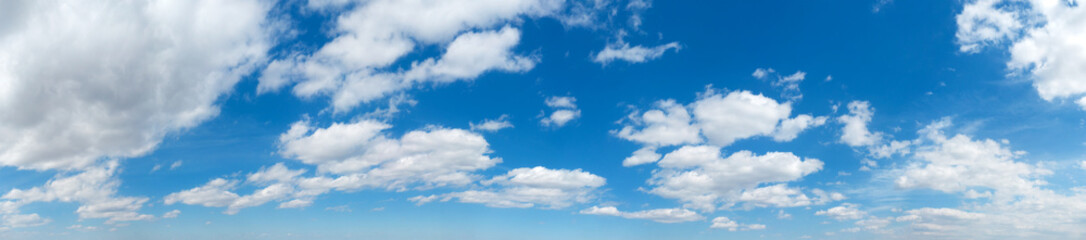 Naklejka na ściany i meble Panorama Blue sky and white clouds. Bfluffy cloud in the blue sky background