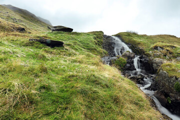 Fototapeta premium waterfall in the mountains of helvellyn