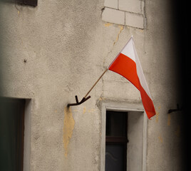 Polish flag and old empty building. Independent day in poland cincept