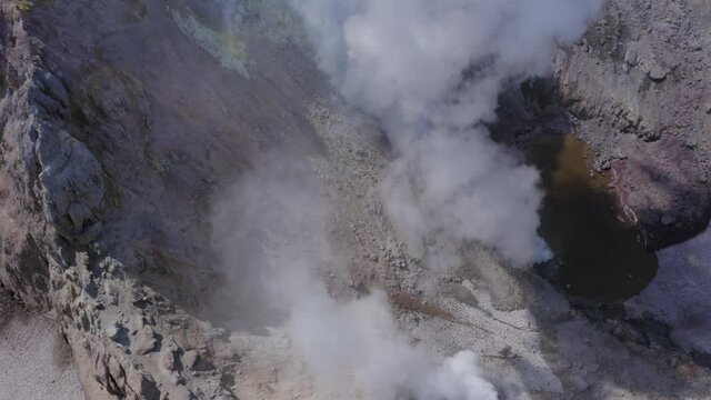 Above the Mutnovsky volcano crater with fumaroles