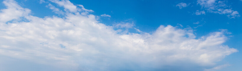 Big white cloud in the blue sky, panorama