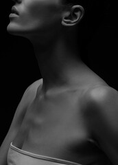 Black-white silhouette of female shoulders and arms. Female silhouette.