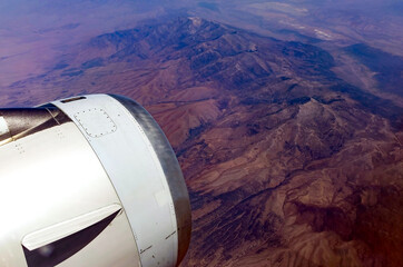 Aerial view of rugged American Southwest with plant engine.