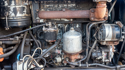 The diesel engine of an old tractor, background.