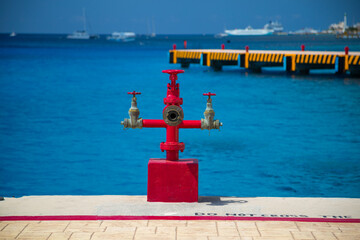 Vibrant Fire Hydrant at Tropical Pier (Cozumel, Mexico)