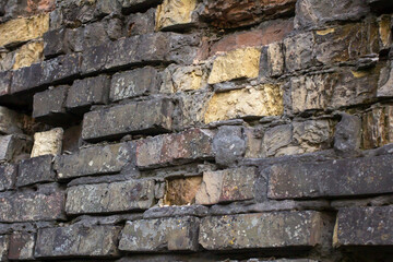 Medieval brickwork. Brick destroyed by time.