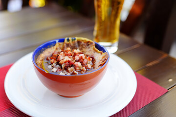 Lithuanian savory potato pudding, known as kugelis or bulviu plokstainis, traditional Lithuanian potato dish.