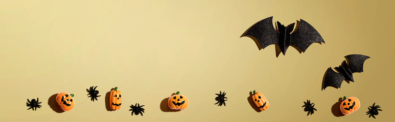 Halloween paper bats and small pumpkin ghosts