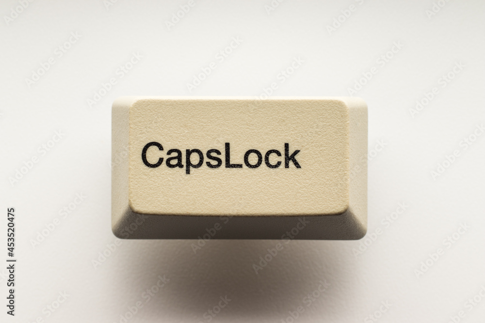 Fototapete caps lock button from computer keyboard
