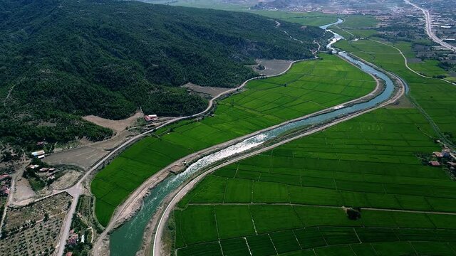 Farmland irrigation canal. A river that runs through the farmland.