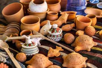 Ukrainian pottery. Pottery museum in Ukrainian village Oposhnya, center of Ukrainian pottery production. Different pottery products: bowls, pitchers, plates in museum.