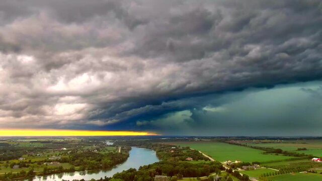 When a thunderstorm had that green glow underneath, severe weather is coming, aerial view from a distance.