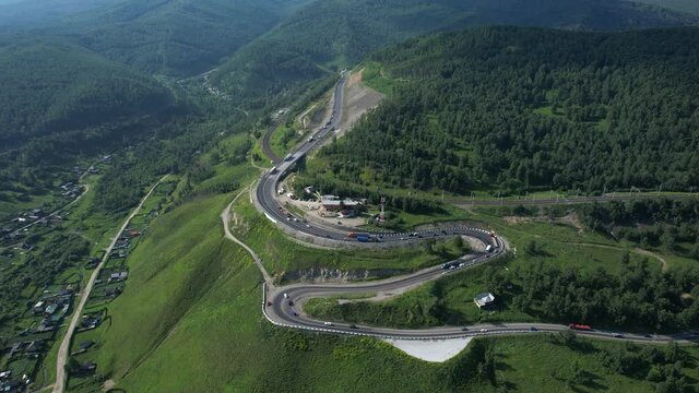 The Baikal serpentine road - aerial view of natural mountain valley with serpantine road, Trans-Siberian Highway, Russia, Kultuk, Slyudyanka