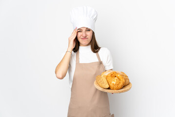 Young woman in chef uniform isolated on white background unhappy and frustrated with something. Negative facial expression
