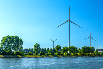 Wind turbines beside a canal in Antwerp - Belgium