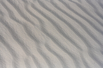 Fototapeta na wymiar Close Up Of Glistening White Sand
