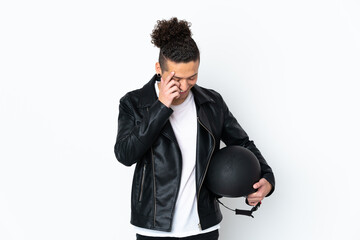 Caucasian man with a motorcycle helmet over isolated white background laughing