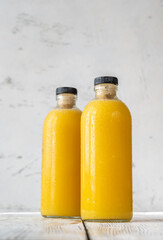 Two bottles of orange juice