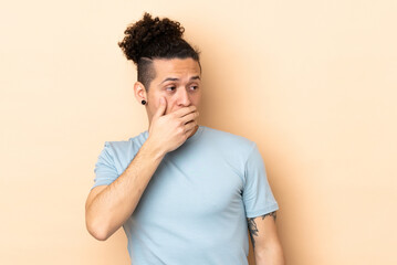 Caucasian man over isolated background doing surprise gesture while looking to the side