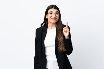 Business woman over isolated white background pointing with the index finger a great idea