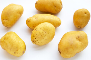 Fresh potatoes on white background.
